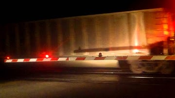 UP 6914 leads westbound empty coal with upcoming eastbound