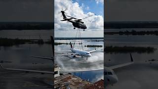 A Big Giant Helicopter Rescues Plane Stuck In Flood.