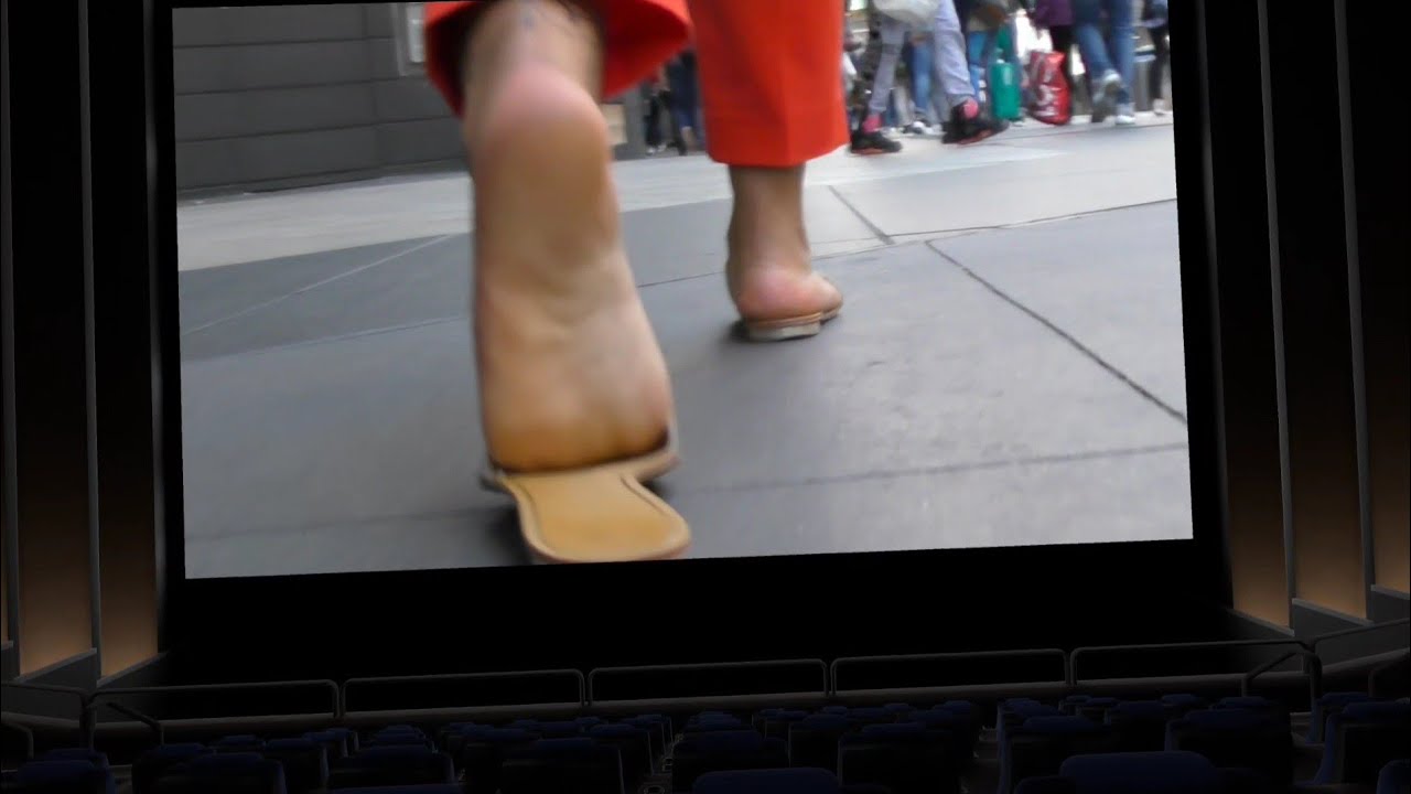 Candid Feet In Slapping Sandals