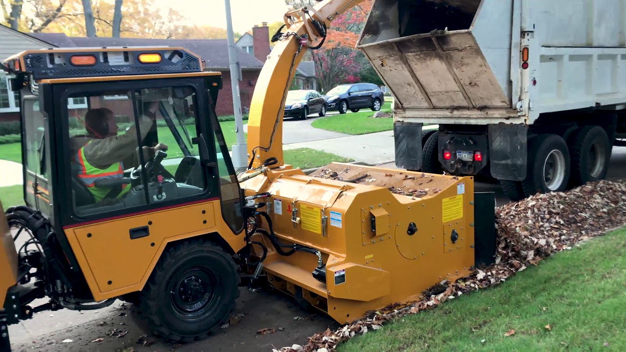 Trackless Articulating Sidewalk Tractor Leaf Loading Demo YouTube