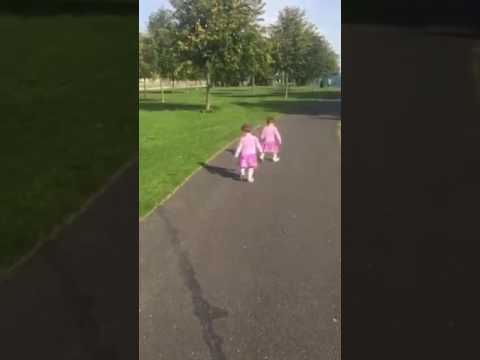 Little girl is afraid of her own shadow