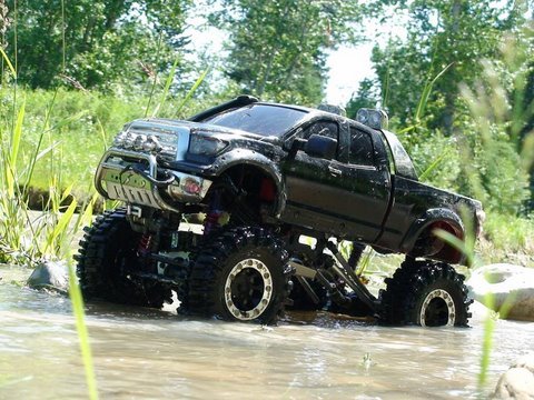 rc trucks in mud and water