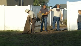 Enoch community comes together to cleanup following devastating flooding