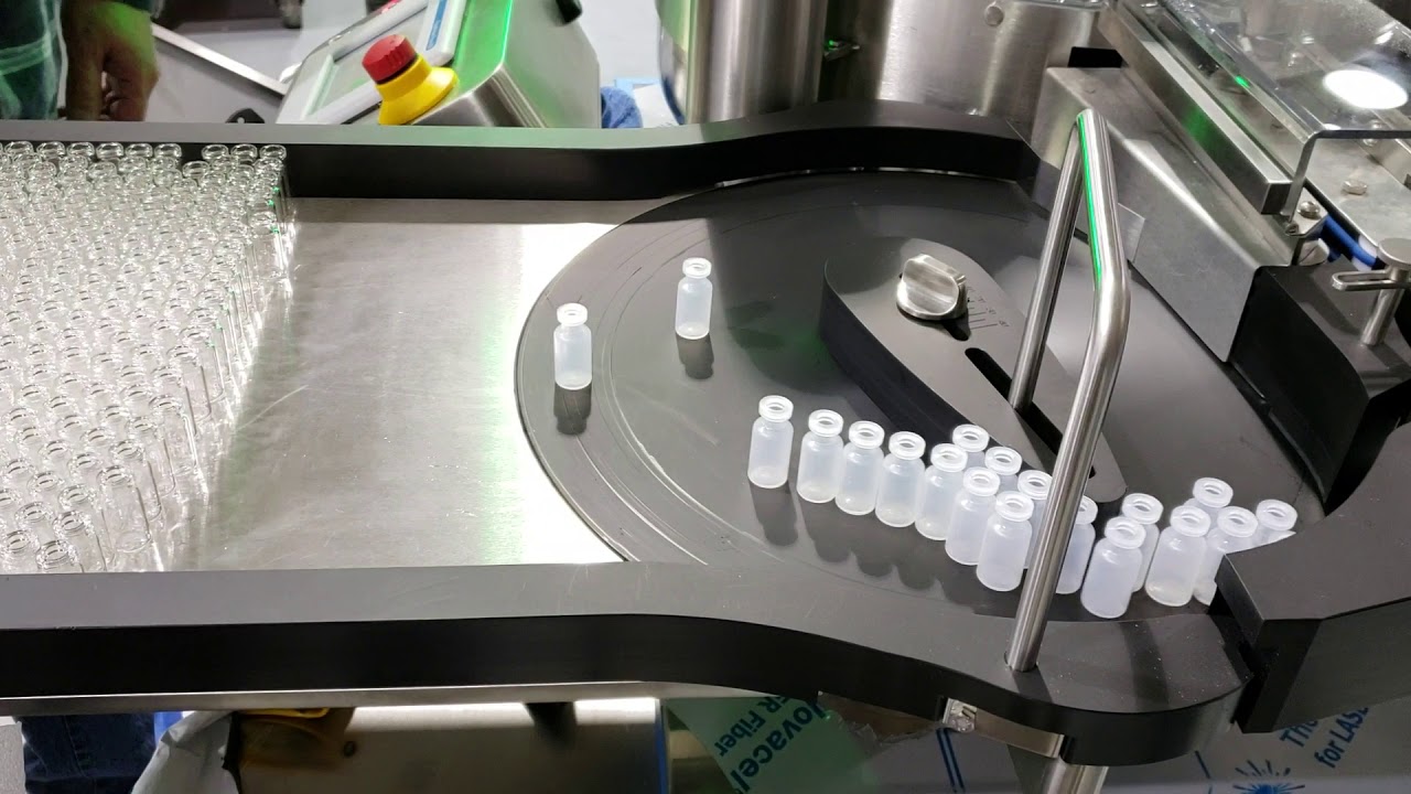 Vial Rocking Table Test Plastic vials on Rotary Table - YouTube