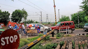 Busy traffic jam at rail gate Furious Rajdhani Express Skipping