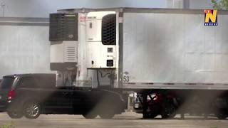 City storing bodies in refrigerated trucks on Brooklyn pier