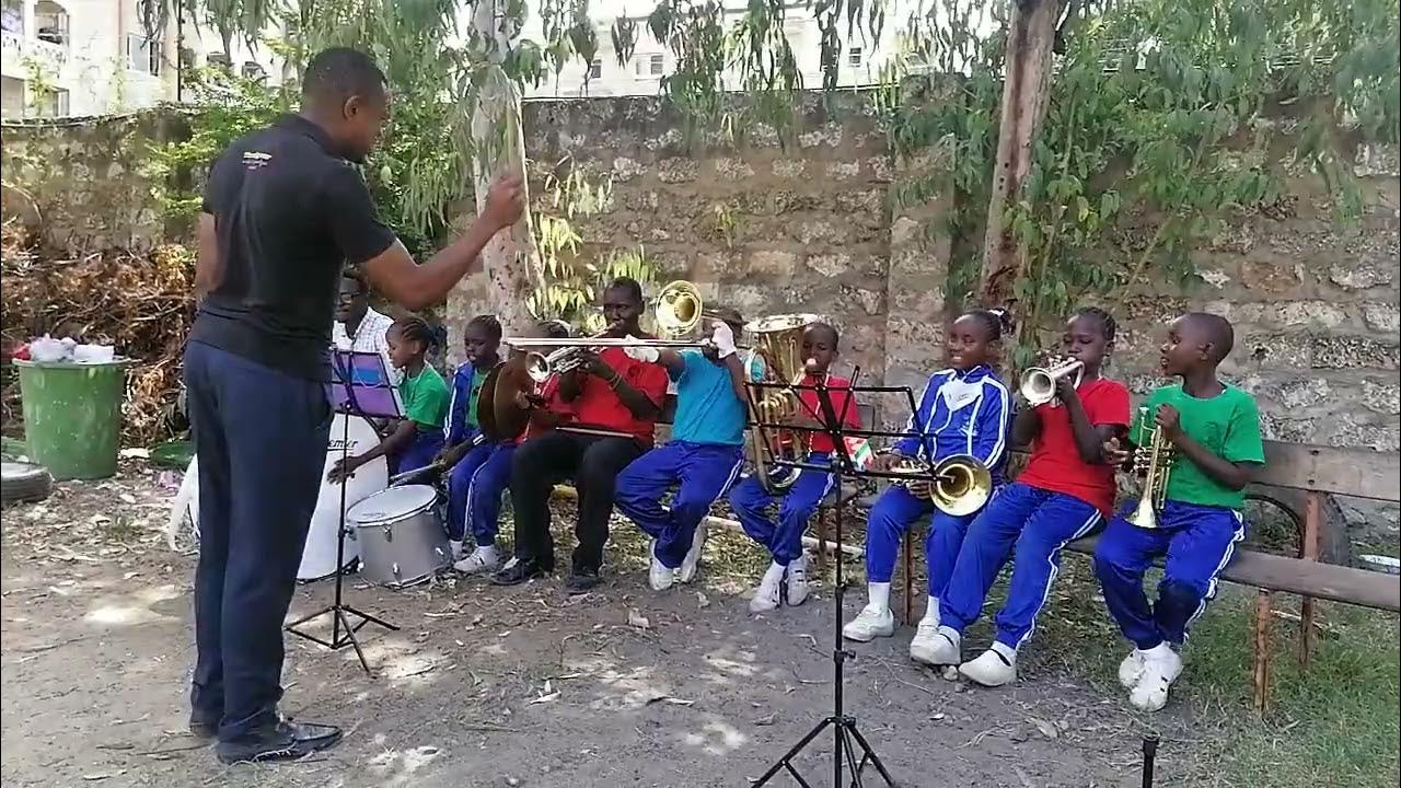 ST JOSEPH TEACHER HILARY AND ERIC KENYA NATIONAL ANTHEM. TROMBONE