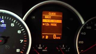 How to adjust the time on a Porsche Cayenne