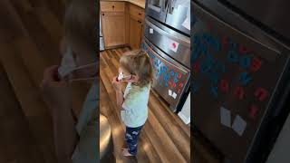 Girl put face mask over her eye then accidentally walks into wall in house