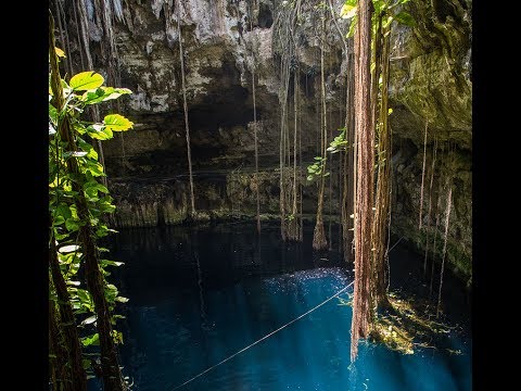 Man on a scooter plunges into sinkhole