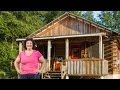 Mortgage Free for Life. Inspiring women shows how to build a log cabin by hand.