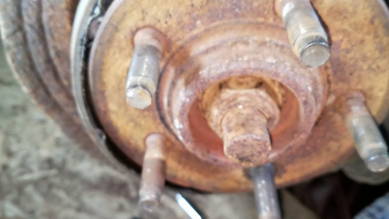 03 Ford Explorer wheel stud and Parking Brake shoe replacement Pt3