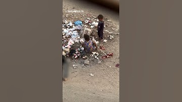 Children search through garbage for food in Gaza