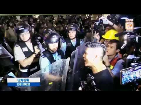 Au Nok Hin, a 3rd-class Legco member in HK, tried to shout at a female police with English.