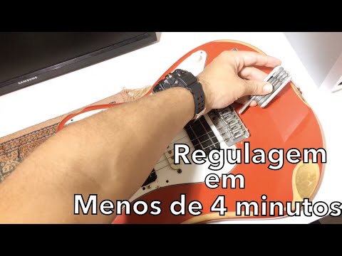 Vídeo: Como Ajustar Sua Guitarra Elétrica