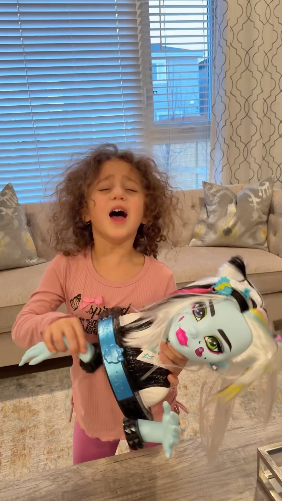 The helpful sister- Sierra helps Rhia and fixes her toy -always help others