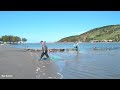 Laguna, SC, Ponta da Lagoa Santo de Antônio dos Anjos, com pesca de tainha na tarrafa de argola.