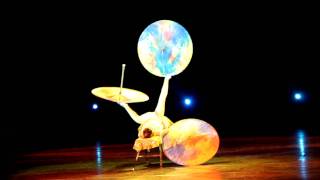 Chinese acrobatics with fans and umbrellas