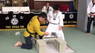 Aaron Liebskind 2nd degree black belt taekwondo brick breaking test