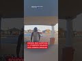 School bus crashes into parked vehicles