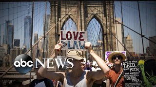 Massive crowds march against Trump administration's immigration policy