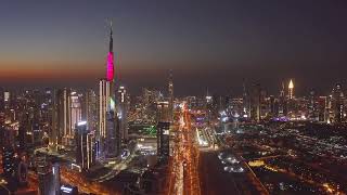 4K Aerial view of Burj Khalifa in Dubai Downtown skyline and highway, United Arab Emirates or UAE screenshot 3