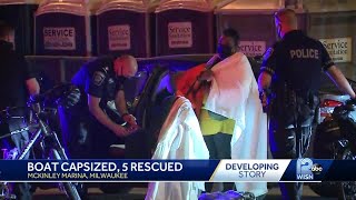 Coast Guard rescues 5 from sinking boat