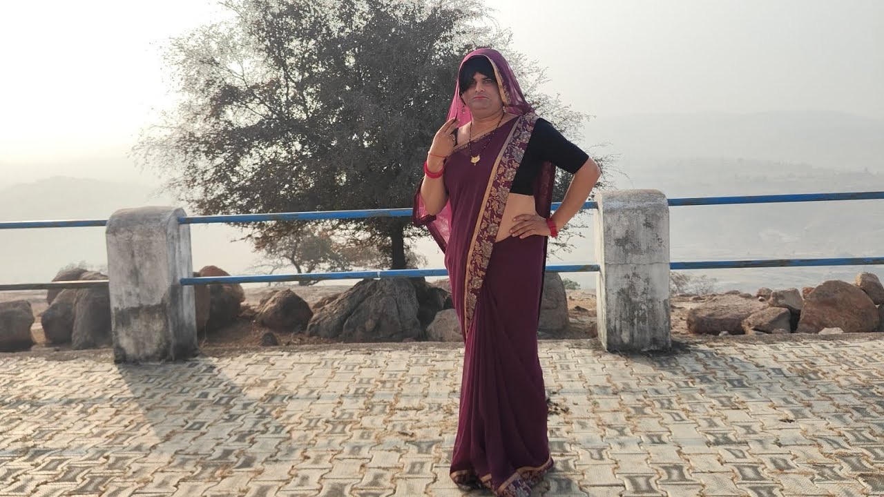 Outing on a hill station.male to female crossdresser on a hill station temple in public.