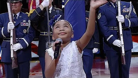 Six-year-old Victory Brinker sings the anthem befo...
