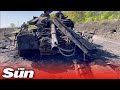 Russian battle tank is left in pieces after Ukrainian blast in Kharkiv