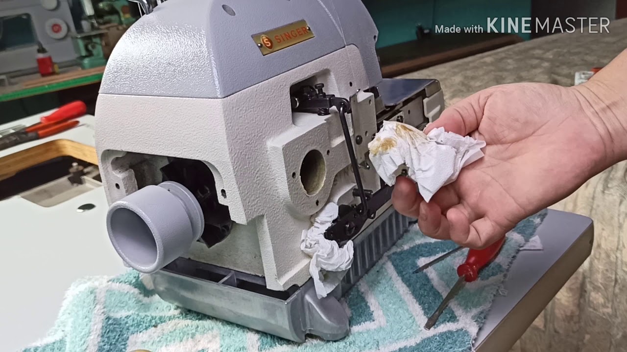 Como trocar o óleo e filtro,máquina Singer interlok industrial ou overloque #maquinasinger