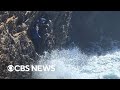 Daring rescue after people were trapped on Australian cliff