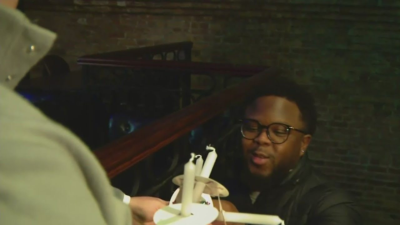 Michigan State University alumni group holds vigil for students killed in shooting