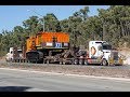 Tri Drive Kenworth with a EX1900 - Heavy Wide Load with Traffic Escort