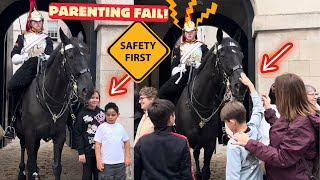 Parenting Fail! Kids Too Close to King's Guard's Horse's Mouth.