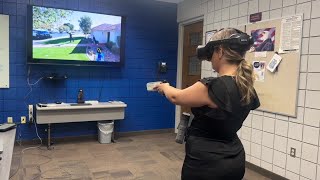 Julie Dunmire tries out Walker Police Department's new virtual reality training simulator