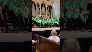 Tomoka elementary singing with Stetson university youth chorus