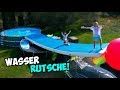 Wir bauen eine RIESEN WASSER RUTSCHE in den POOL! (aus Trampolin Gerüst!)