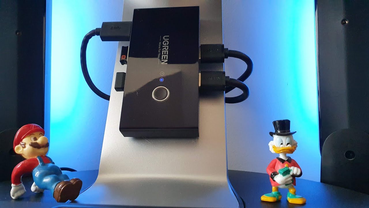 EKL Commutateur USB 3.0 Pour 4 Ordinateurs Partageant Des Périphériques USB, 4 Ports USB, Souris Et Scanner, Avec Sortie Audio Jack 3,5 Mm, Comprend 4 Câbles USB 3.0 Et Une Télécommande