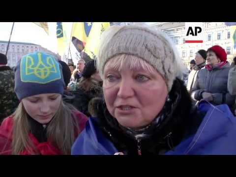 Thousands march to mark first anniversary of Maidan protests