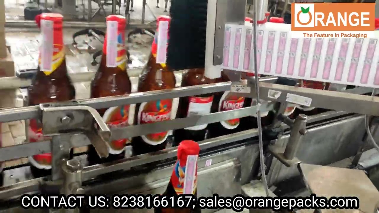 HIGH SPEED PAPER HOLOGRAM APPLICATOR MACHINE FOR EXCISE LABEL ON BEER BOTTLES.