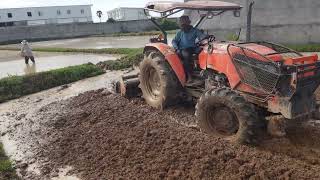 Wow Tractor Kubota M6040SU plought the rice field is strong. #bulldozer #dumptruck #excavator