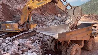 Liebherr 974 Excavator Loading Caterpillar 775B Dumpers  Sotiriadis/Labrianidis Quarry Works