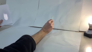 Forming a real image (enlarged) with a converging/convex lens