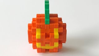 Crafting a Jack-O'-Lantern using Plus Plus