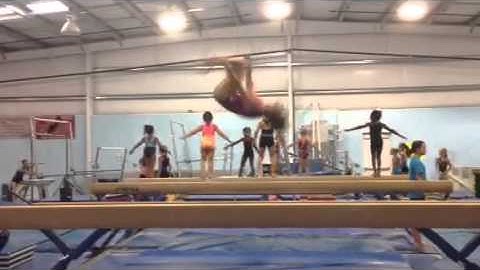 switch leap back tuck split jump