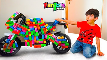 Jason Plays with Toy Blocks