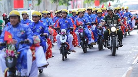 Đám cưới tập thể của 100 cặp đôi trên phố Sài Gòn ngày 2/9