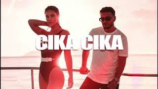 Capital T “CIKA\