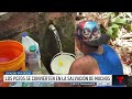 Hacen fila en Cupey para buscar agua de manantial